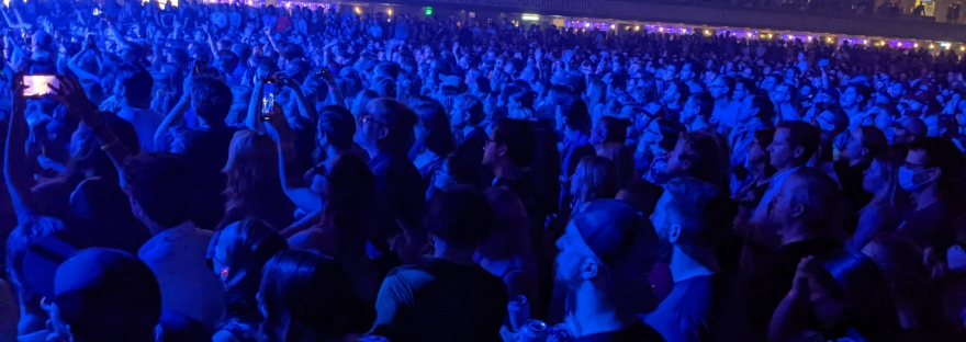crowd at concert at the Armory, purple lighting